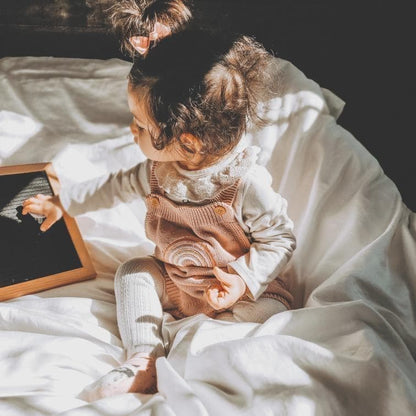 Rainbow knitted romper | blush